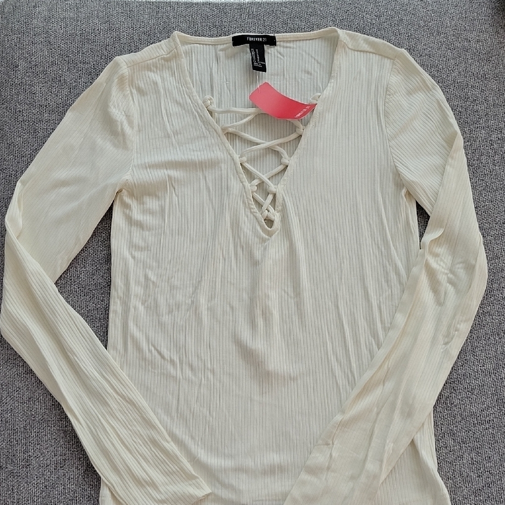 Elegant Cream Lace-Up Top